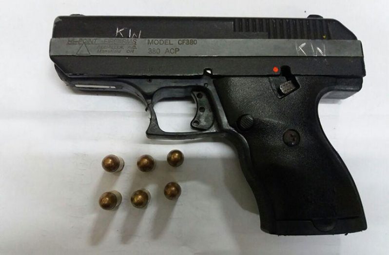 The illegal gun with ammo found on the men