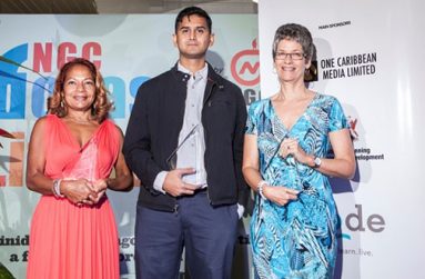 (Imam, flanked by the second and third place winners of the Burt Award last year
Image via: BocasLitFest.com)