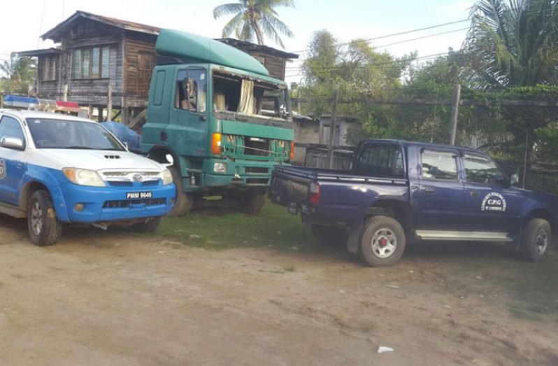 The CPG vehicle (left) that is impounded at Number 51 Police Station