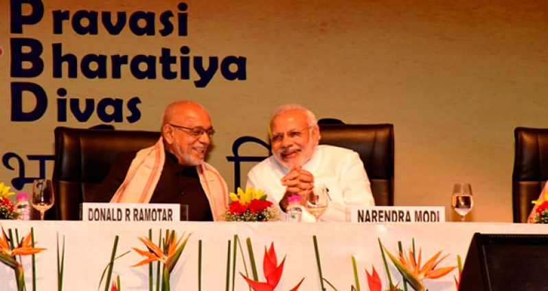 President Donald Ramotar in discussion with Indian Prime Minister Narendra Modi. (Photo by Sandra Prince)