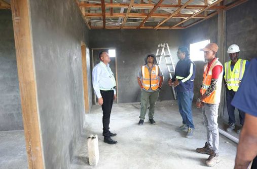 Minister of Housing and Water, Collin Croal, visited the construction site to engage with several contractors involved in the project