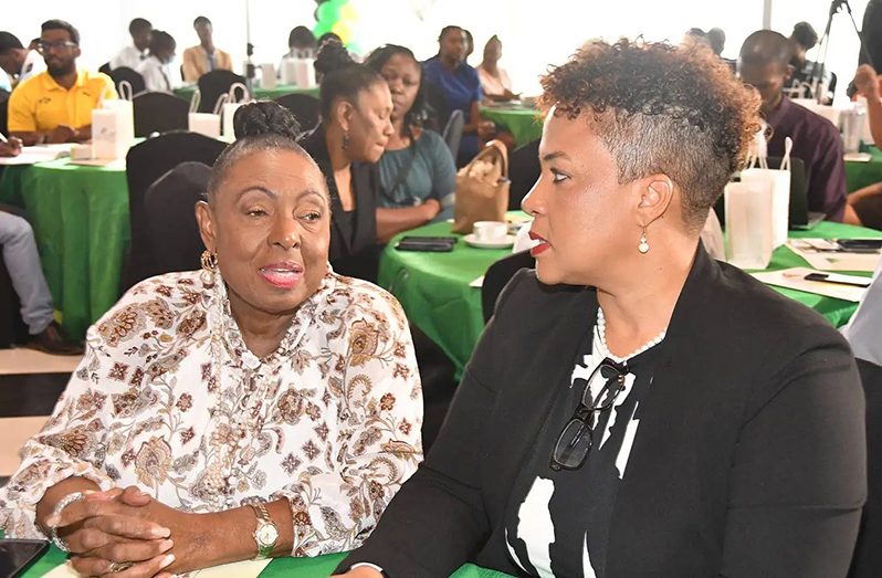 Olivia ‘Babsy’ Grange (left), sports minister, in discussion with Debby Ann Brown-Salmon, chairperson of the Jamaica Anti-Doping Commission (JADCO) (Photo: Garfield Robinson)