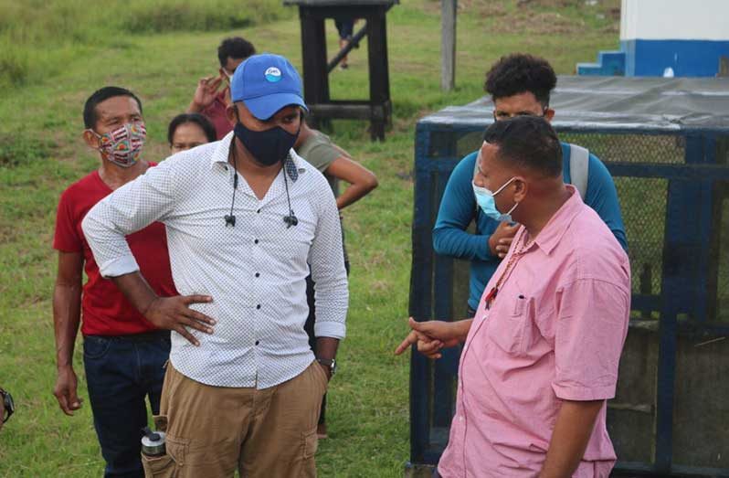 Housing and Water Minister, Collin Croal, addressing the water issues at Santa Rosa (DPI photo)