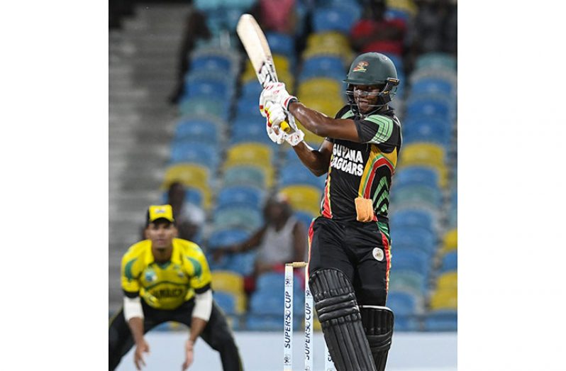 : Skipper Leon Johnson hits  a boundary during his century in the first semi-final match of the Super50 Cup between Guyana Jaguars and Jamaica Scorpions last night  at Kensington Oval.(© CWI Media/Randy Brooks of Brooks LaTouche Photography