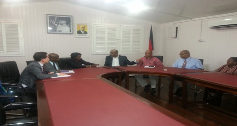 Opposition Leader, Bharrat Jagdeo in discussion with Deputy Secretary General Dr. Josephine Ojiambo (3rd left) as delegates from the PPP and Commonwealth Secretariat look on