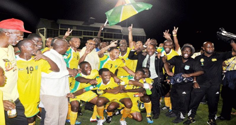 Flashback! The Golden Jaguars celebrate after a historic victory over Trinidad and Tobago on 11.11.11 at the Guyana National Stadium.