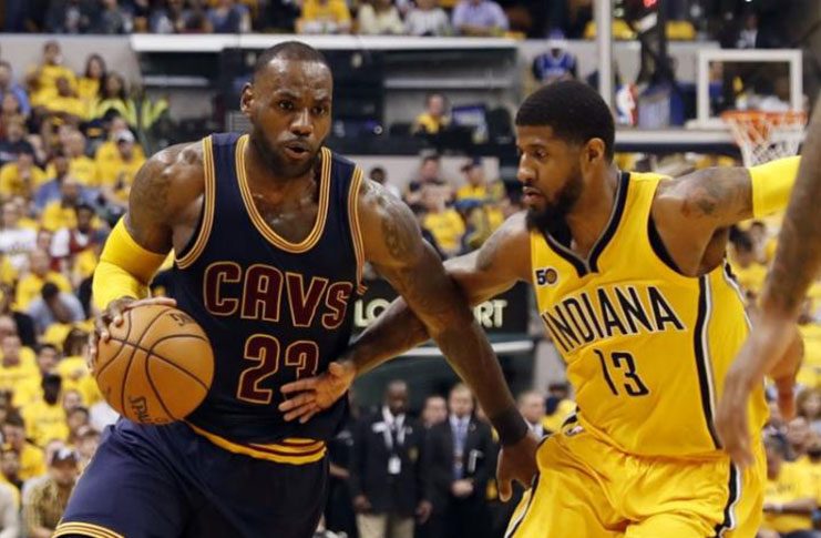 Cleveland Cavaliers forward LeBron James (23) drives to the basket against Indiana Pacers forward Paul George (13) in game three of the first round of the 2017 NBA Playoffs at Bankers Life Fieldhouse. (Mandatory Credit: Brian Spurlock-USA TODAY Sports)