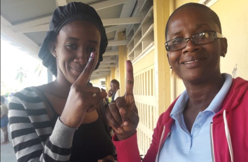 Another first time voter Mia Hodge and her mother Althea.