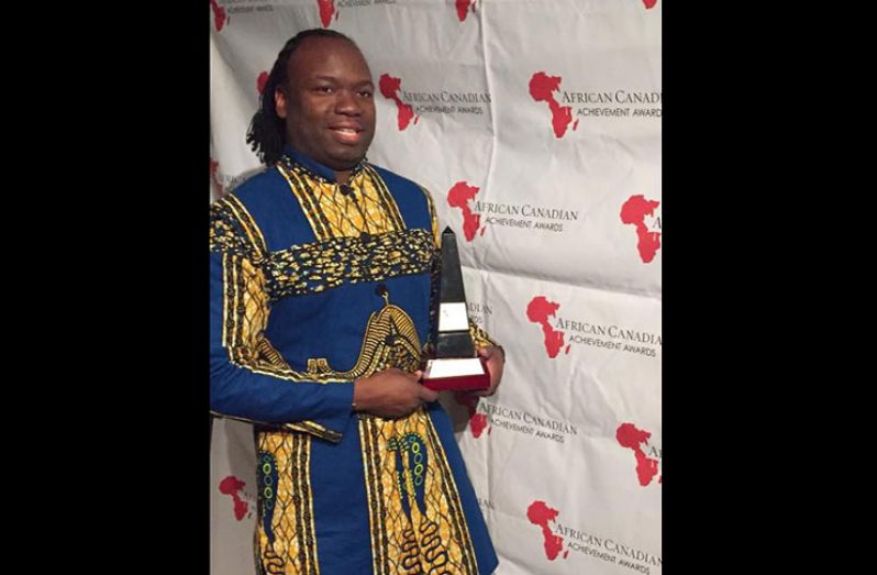 John O’Dell poses with his award.