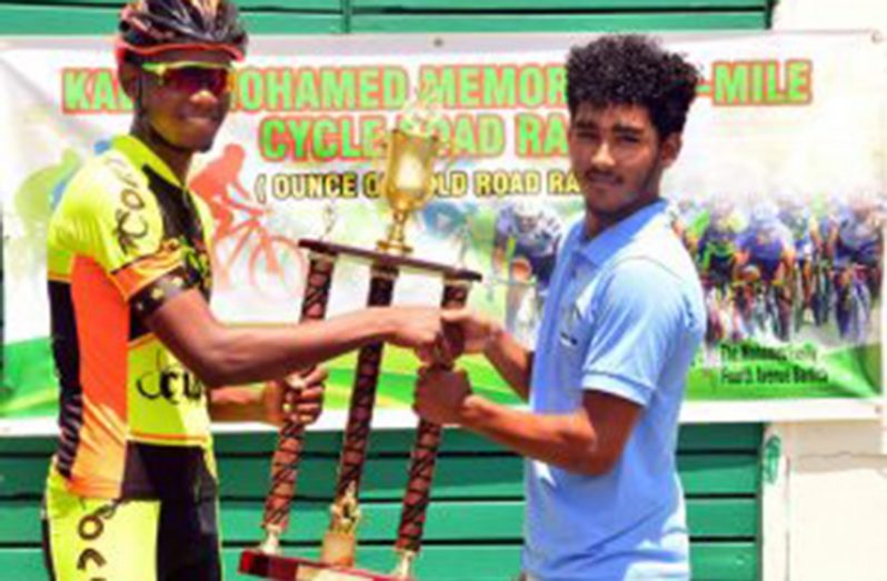 FLASHBACK! Jamual John receives his trophy after emerging victorious last year.