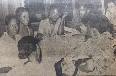 President Forbes Burnham (at left) in discussion with members of the PSU Drama Group (Farrier partly backing camera)