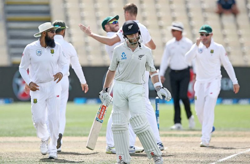 Kane Williamson walks off after being dismissed for 176 on the 4th day.