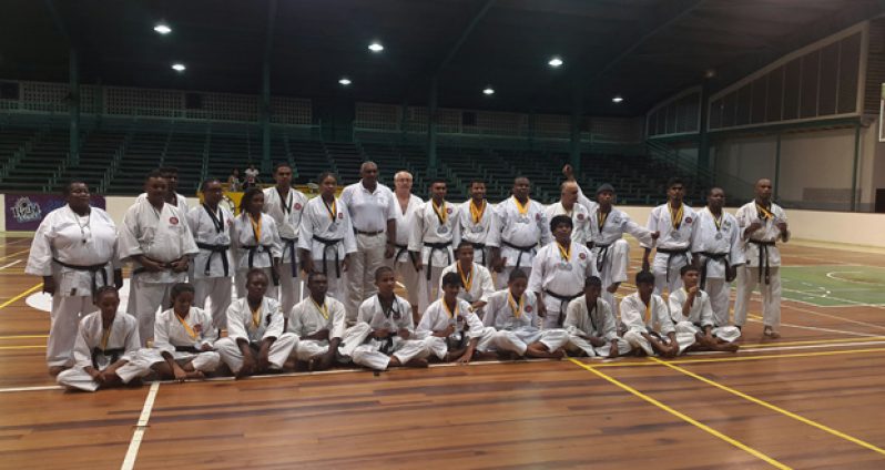 The participants of the 2015 Senior National Karate Championships display their awards at the conclusion of the event.