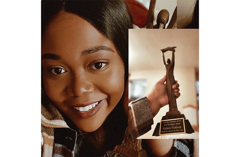 Keysha poses with her Arts & Culture award