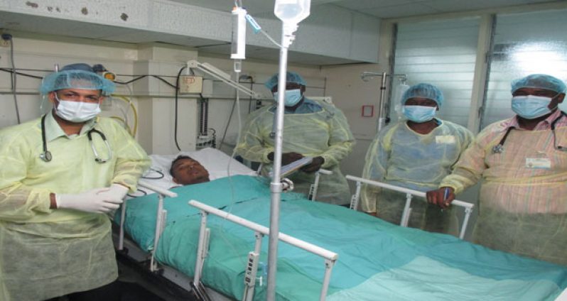 The kidney transplant team poses with the patient Kiran Hardyal during his recovery at the GPHC