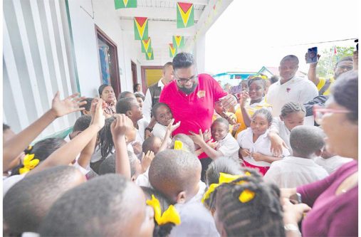 President Dr Irfaan Ali earlier this month visited the St Gabriel’s Primary School where he was met with an outpouring of love from pupils and teachers. The President, in addition to interacting with scores of children, shared some time with teachers, whom he thanked for their hard work and dedication. In a show of support and appreciation, the President also donated laptops to the school (Office of the President photo)