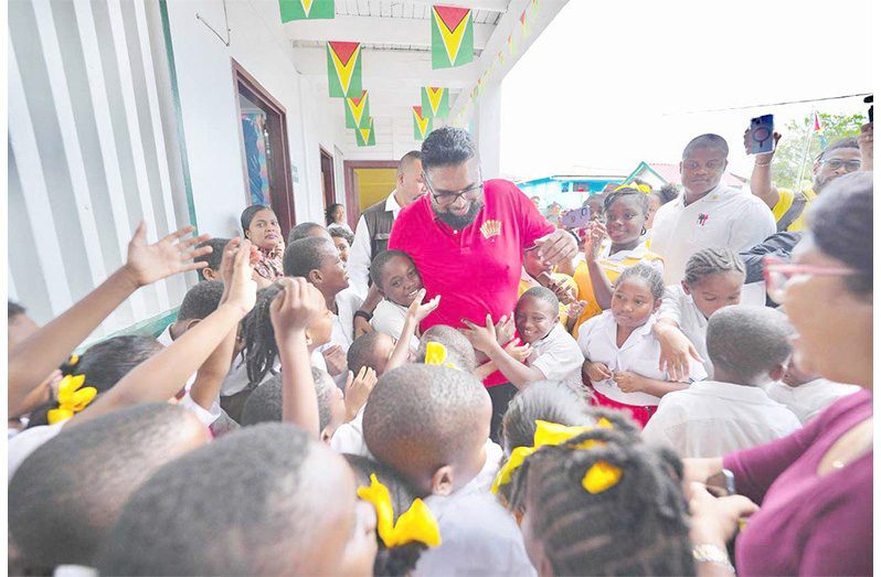 President Dr Irfaan Ali earlier this month visited the St Gabriel’s Primary School where he was met with an outpouring of love from pupils and teachers. The President, in addition to interacting with scores of children, shared some time with teachers, whom he thanked for their hard work and dedication. In a show of support and appreciation, the President also donated laptops to the school (Office of the President photo)