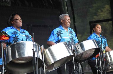 'Kirk'and his daughter Miranda (right) playing in the Phase 5 steel band