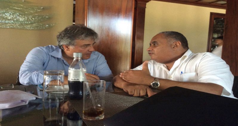 One of the businesses to be represented on the May 10 to 14 trade and investment mission to Guyana is the top Italian company ASTALDI. Here Wesley Kirton, mission co-ordinator, is pictured in discussion with ASTALDI's General Manager for the Americas Dr. Mario Pieragostini, during the recent trade and investment mission to Belize, at Placencia, Belize