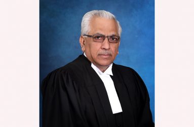 Dhanam Kissoon in his legal attire