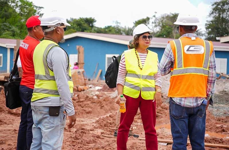 Minister of Education, Priya Manickchand, engages contractors at the Kwebanna Secondary School, Region One