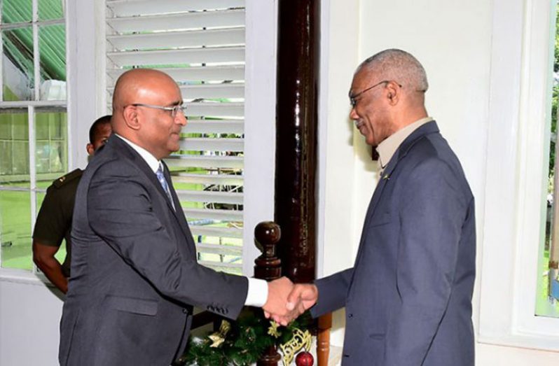 President David Granger greets Opposition Leader, Mr. Bharrat Jagdeo, upon his arrival at State House (MOTP)