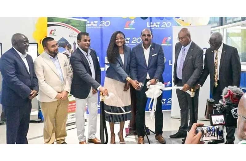 Prime Minister of Antigua and Barbuda, Gaston Browne, and Minister of Public Works, Bishop Juan Edghill; CEO of the Cheddi Jagan International Airport, Ramesh Geer, and Director of the Guyana Tourism Authority, Kamrul Baksh and Antigua and Barbuda delegation cutting ribbon during the inaugural flight of Liat 2020