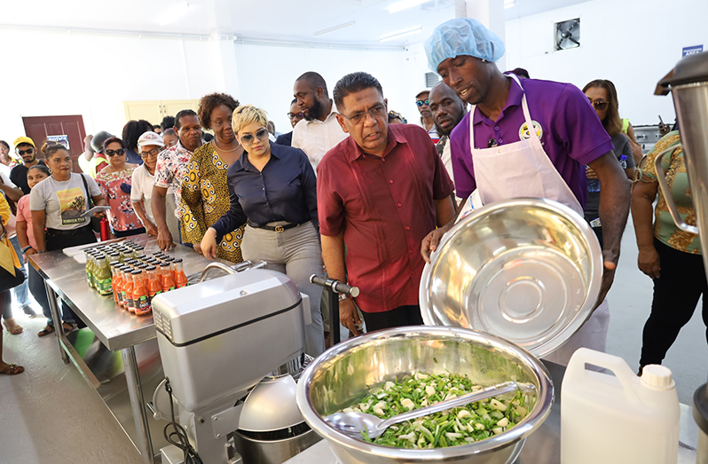 Agriculture Minister Zulfikar Mustapha and other officials touring the agro-processing facility that was commissioned at Linden in 2023