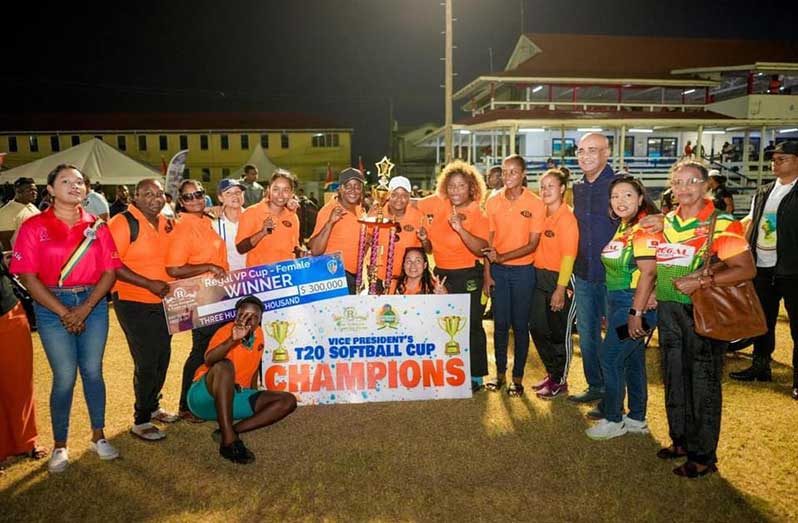 The victorious 4 R Lioness players celebrate their triumph in the presence of Vice-president Dr Bharrat Jagdeo