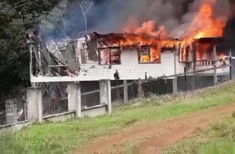 The building at Mabaruma which once housed the Cuban doctors engulfed in flames
