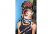 Natalia Lekha’s makeup look in protest of the recent brutal West Coast Berbice killings