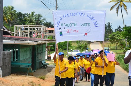 march Health practitioners from the Moruca District Hospital lead the march along the Moruca access road to the Santa Rosa Secondary School