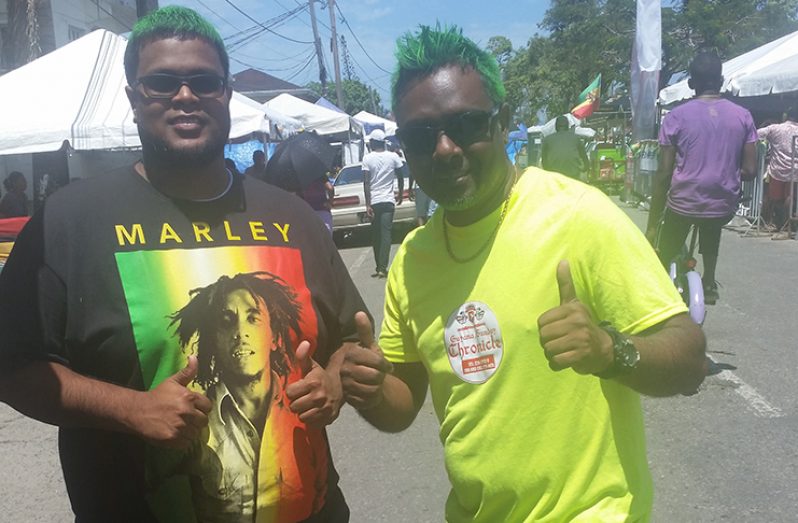 Guyana Chronicle staff, Akash Persaud and his brother-in-law decided to dye their hair fluorescent green for Mash! “Green represents Guyana’s forests and it is a colour on our National Flag,” Akash said.