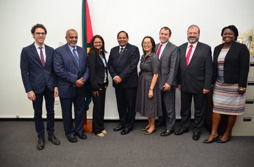 Prime Minister Moses Nagamootoo flanked by Deputy UN Resident Coodinator Shabnam Mallick (left) and UN Resident Coodinator Mikiko Tanaka (right) with (at left) Fabio Oliva, Rohan Edrisinha, Gerardo Noto and Jason Gluck of the UNDP delegation. At extreme right is Coordinator of Governance, Tamara Khan