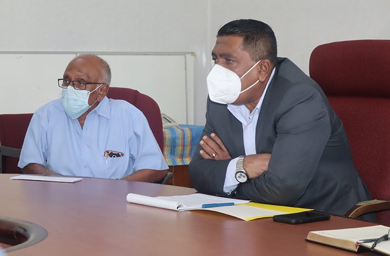 From left: Newly appointed Chairman of the Cane Farmers Committee, Roy Hanoman Singh and Agriculture Minister Zulfikar Mustapha