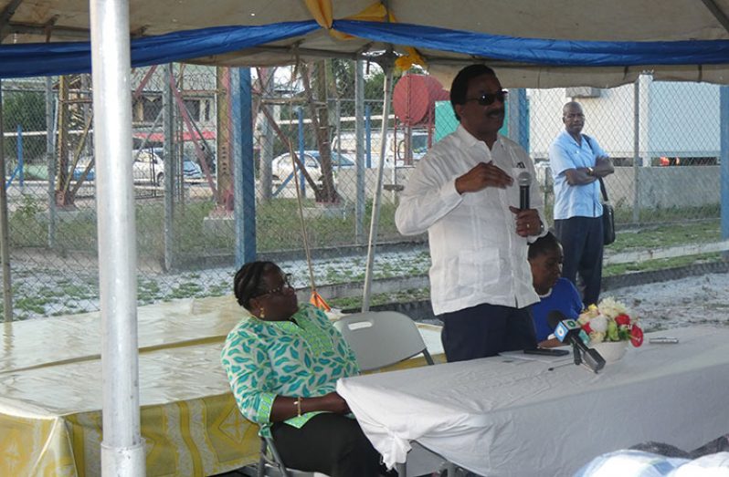 Attorney General Basil Williams addresses Lindeners in the presence of his colleagues, Ministers Simona Broomes and Valerie Yearwood