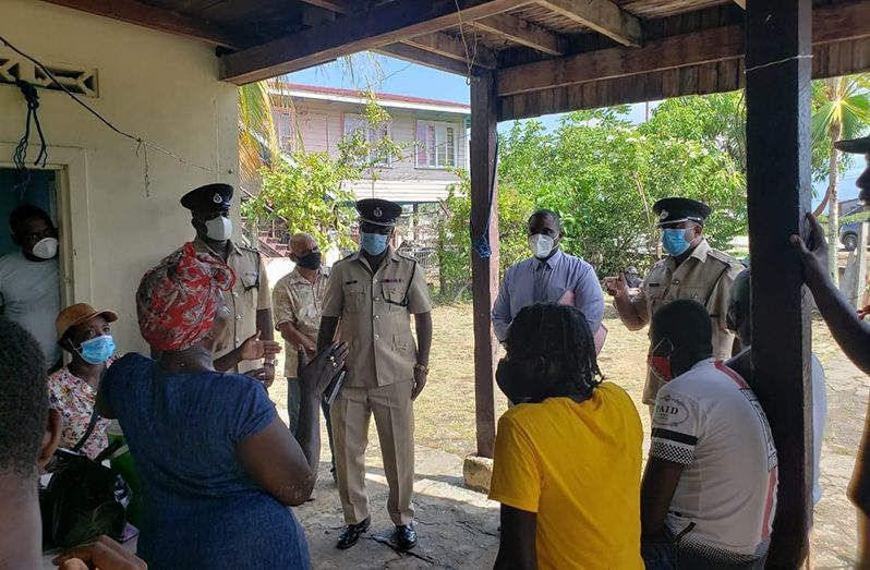 Commander of ‘B’ Division Senior Superintendent, Linden Isles; Deputy Commander, Superintendent, Mahendra Singh and other officers and members from Cops and Faith during a visit to Jonas’s family on Monday 