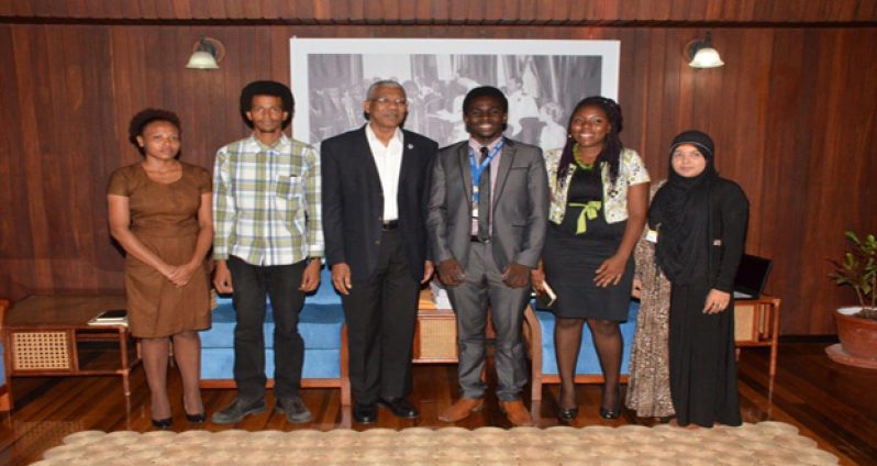 President David Granger is flanked by, from left: Tricia Williams, Secretary of the
UGSS; incoming President Ron Glasgow; outgoing President Joshua Griffith; outgoing
Vice-President Xiomara Griffith; and Roxanne Gomes from the Tain, Berbice Campus