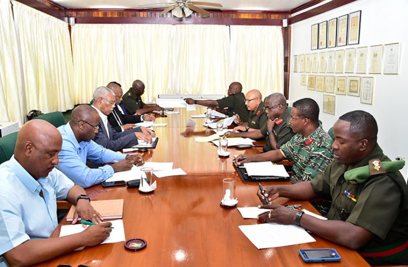 President David Granger and his team, which includes, Minister of State, Joseph Harmon meeting with the high command of the Guyana Defence Force (MoTP photo)