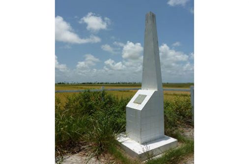 A memorial has been set up at the site where the indentured Indian immigrants lived at Bush Lot