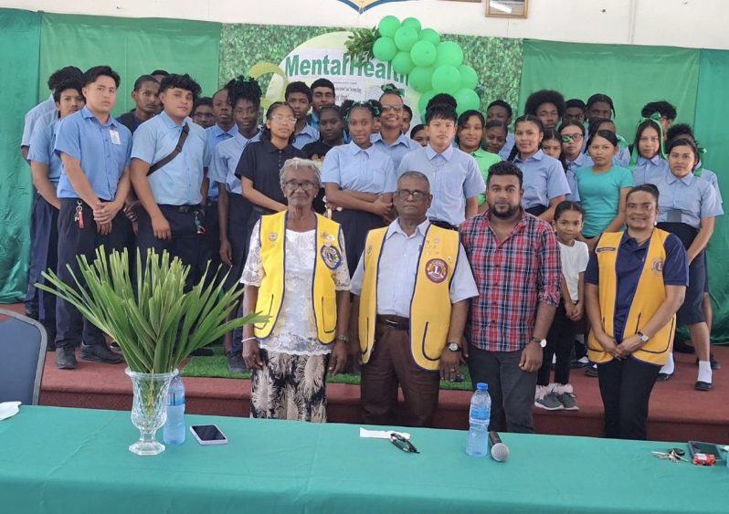 The Lions Club members, Dr Zubair Mohammed, Government Medical Officer and Mental Health Specialist and students of the Essequibo Technical Institute (ETI)  at the mental health session on October 10