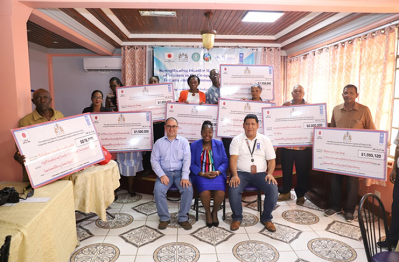 Recipients of the UNDP’s micro-grants along with UNDP Resident Representative, Jairo Valverde, Minister within the Ministry of Agriculture with responsibility for Rural Affairs, the Hon Valerie Adams-Yearwood and Jason Chacon, Project Manager