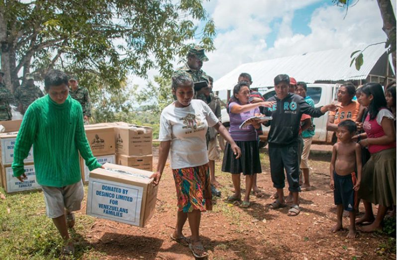 Hampers were distributed to Venezuelan migrants at Khan’s Hill outside Mabaruma as well as at White Water Village and Gajah Landing near the indigenous village in 2018 (File photo)