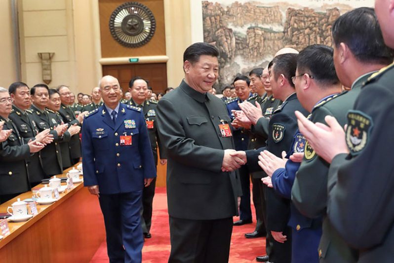 President Xi Jinping, also general secretary of the Communist Party of China Central Committee and chairman of the Central Military Commission, attends a plenary meeting on Tuesday of the delegation of the People’s Liberation Army and the People’s Armed Police Force to the second session of the 13th National People’s Congress in Beijing. [Photo/Xinhua]
