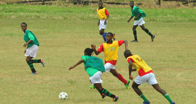 Part of the action in yesterday’s preliminary round of this year’s Milo/Petra Organization Under-20 Inter-Schools football championships