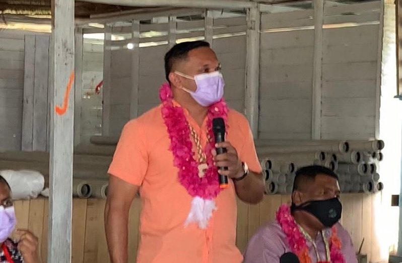 Natural Resources Minister Vickram Bharrat during a recent meeting with residents of Orealla/Siparuta