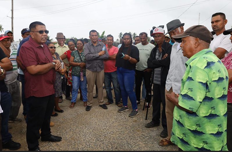 Minister of Agriculture Zulfikar Mustapha addressing Bush Lot residents on Saturday