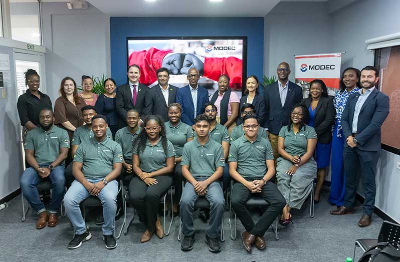 Minister of Labour Joseph Hamilton is flanked by members of the MODEC Guyana team, trainees, interns and other key stakeholders at Thursday’s commencement ceremony (Photo by Delano Williams)