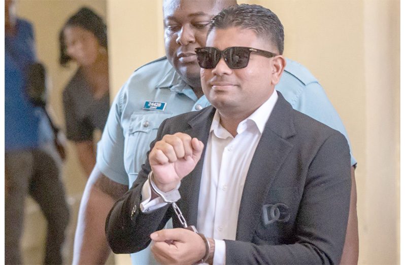 US-sanctioned Guyanese businessmen, Azruddin Mohamed following his court appearance on Thursday (Delano Williams photo)