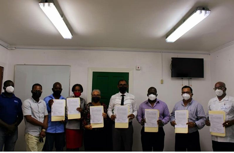 The management of Guyana Power and Light with Deputy Chief Executive Officer, Mr. Renford Homer; Bal Persaud, Divisional Director for Human Resources and representatives of the union.